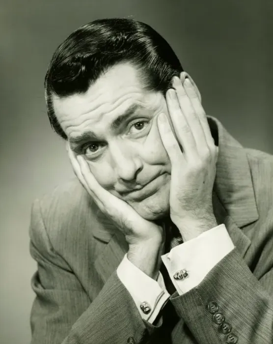 Framed Print : Businessman in studio holding head in hands, (B&W), portrait Framed Print : Businessman in studio holding head in hands, (B&W), portrait