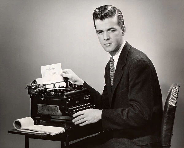 Businessman typing letter