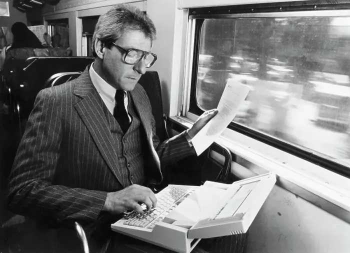 Framed Print : Businessman Using Early Laptop Framed Print : Businessman Using Early Laptop