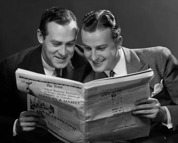 Framed Print : Two businessmen reading newspaper Framed Print : Two businessmen reading newspaper