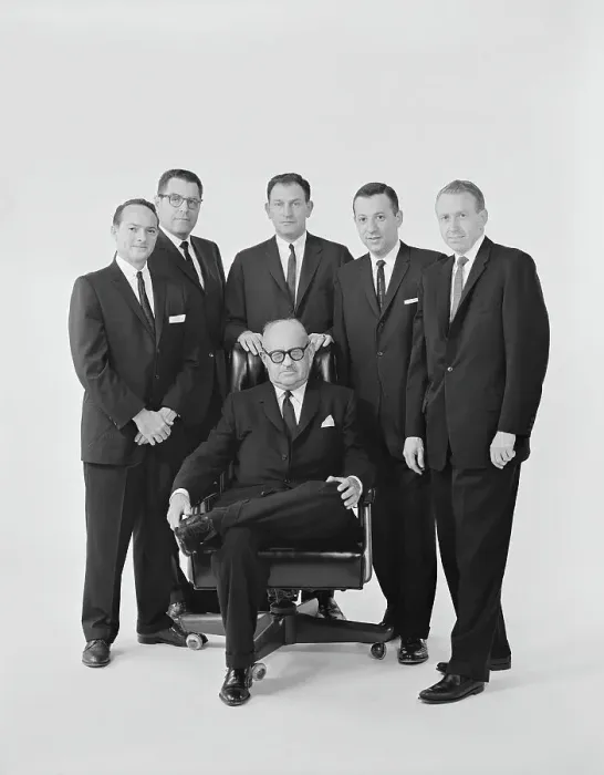 Framed Print : Businessmen against white background, portrait