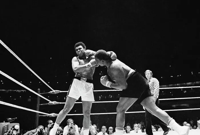 Framed Print : Buster Mathis Punching Muhammad Ali Framed Print : Buster Mathis Punching Muhammad Ali