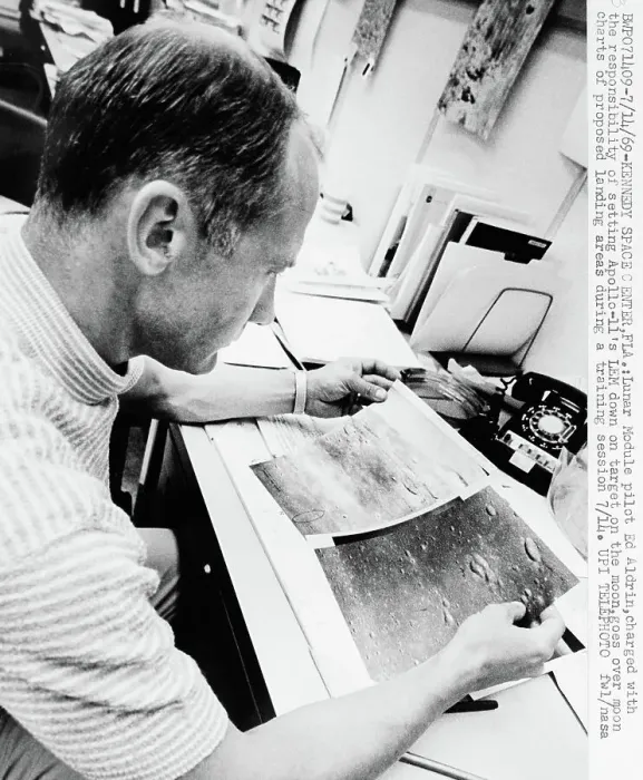 Framed Print : Buzz Aldrin Examining Lunar Shots at Kennedy Space Center Framed Print : Buzz Aldrin Examining Lunar Shots at Kennedy Space Center
