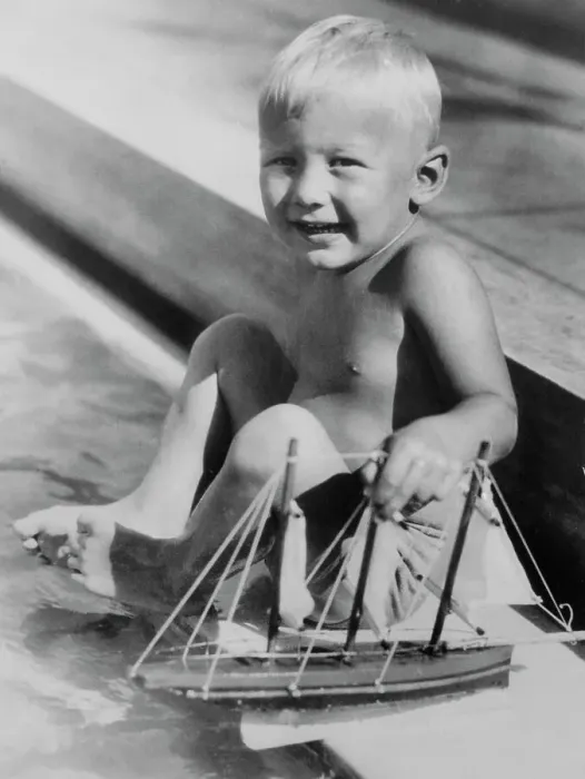 Framed Print : Buzz Aldrin Playing with Toy Boat Framed Print : Buzz Aldrin Playing with Toy Boat