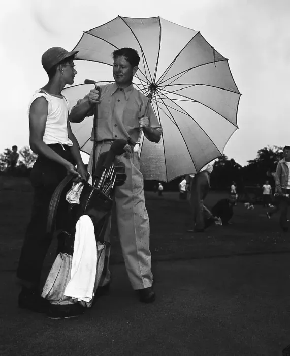 Framed Print : Byron Nelson Choosing Golf Club in the Rain