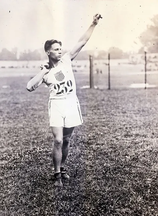 Framed Print : C. Houser Throws Weights at Olympics