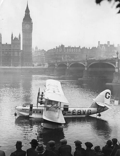 Calcutta. 1928: The seaplane Calcutta lying off the Houses of Parliament on the Thames