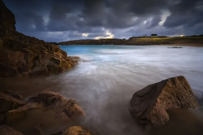Framed Print : Calm waves on rocks at sunset Framed Print : Calm waves on rocks at sunset