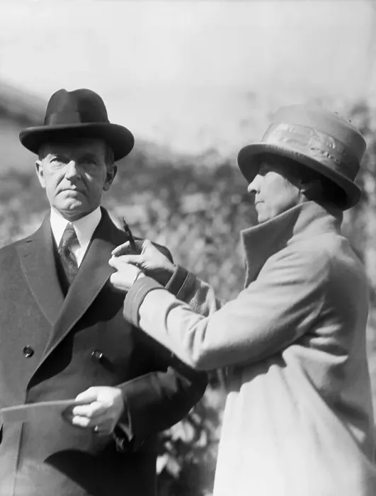 Framed Print : Calvin Coolidge Being Pinned by His Wife Framed Print : Calvin Coolidge Being Pinned by His Wife