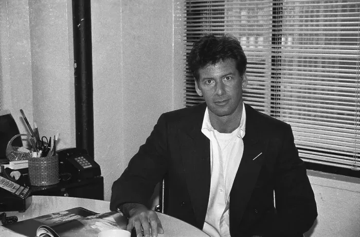 Framed Print : Calvin Klein Sitting at Desk Framed Print : Calvin Klein Sitting at Desk