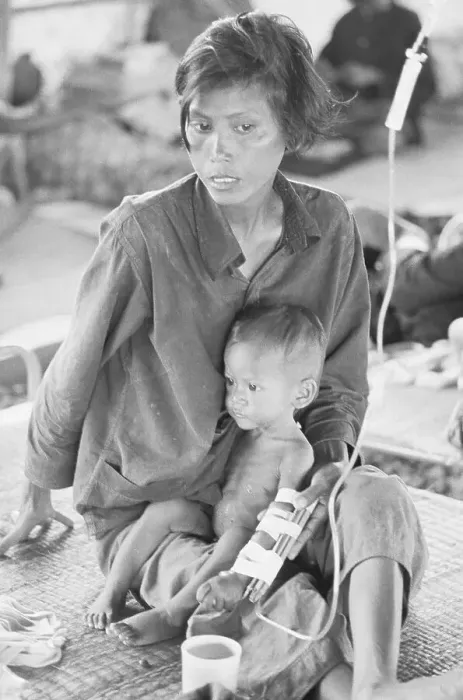 Framed Print : Cambodian Refugee Mother and Son Framed Print : Cambodian Refugee Mother and Son