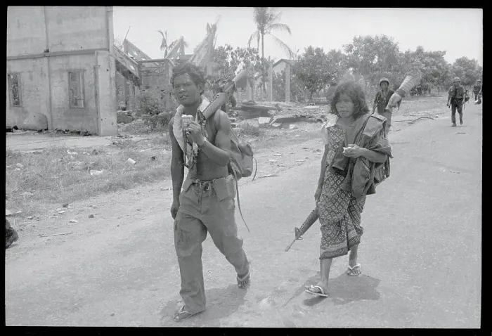 Framed Print : Cambodian Soldier and Wife Fleeing Framed Print : Cambodian Soldier and Wife Fleeing