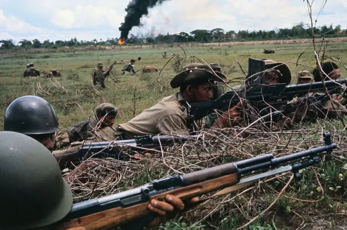 Framed Print : Cambodian troops Taking Cover