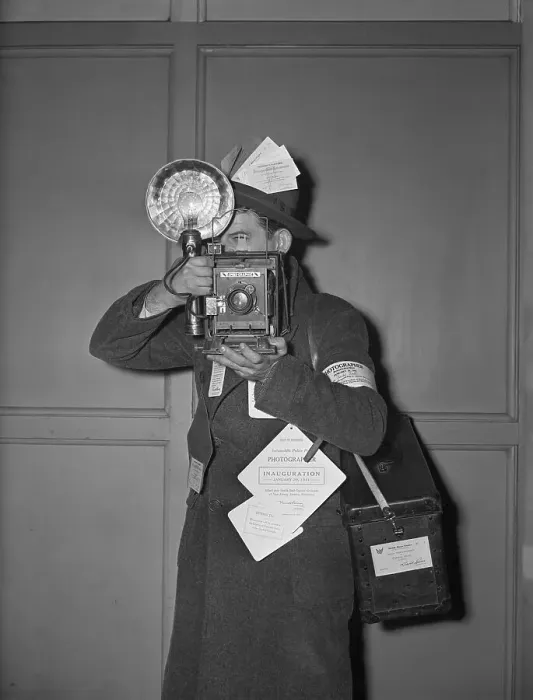 Framed Print : Cameraman with Camera, and Press Passes in His Hat Framed Print : Cameraman with Camera, and Press Passes in His Hat