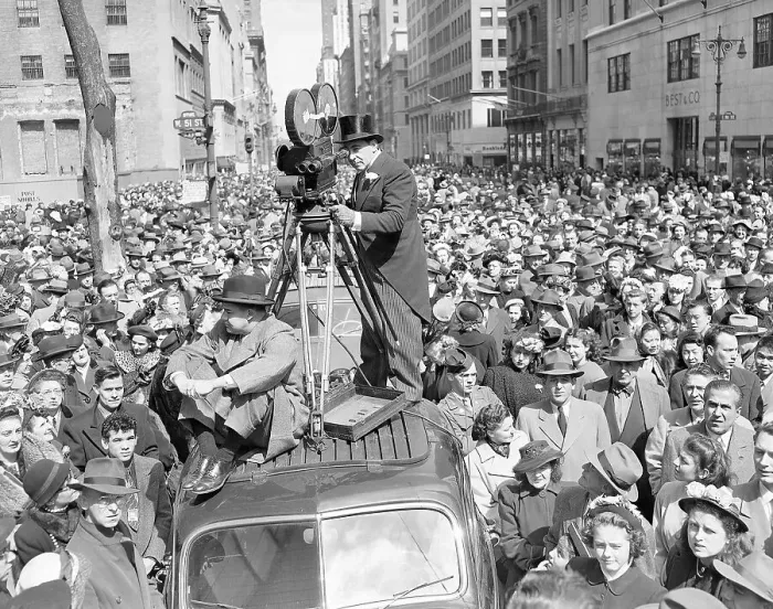 Framed Print : Cameraman Filming the Easter Parade Framed Print : Cameraman Filming the Easter Parade