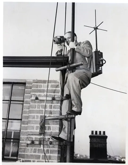 Framed Print : Cameraman on Flagpole with Portable Television Camera