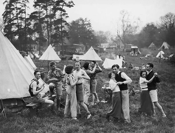 Campers Make Merry. Campers on Box Hill enjoy the Whitsun weekend with