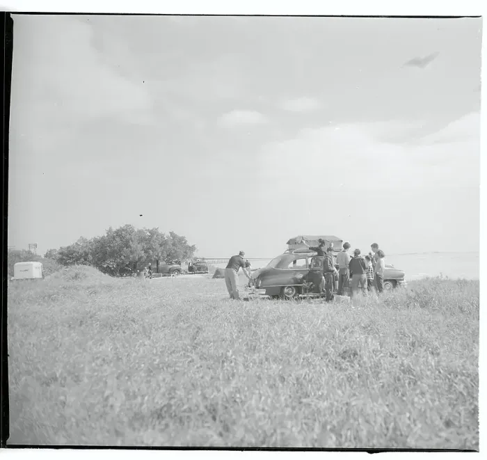 Framed Print : Campers Unloading Their Car