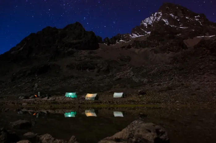 Framed Print : Camping at the Base of Mazwenzi Peak Framed Print : Camping at the Base of Mazwenzi Peak