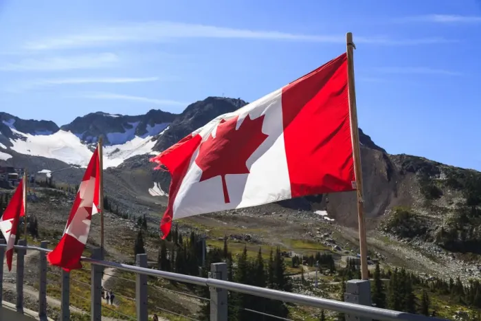 Framed Print : Canadian flags in Whistler Resort in early Fall, British Columbia, Canada Framed Print : Canadian flags in Whistler Resort in early Fall, British Columbia, Canada