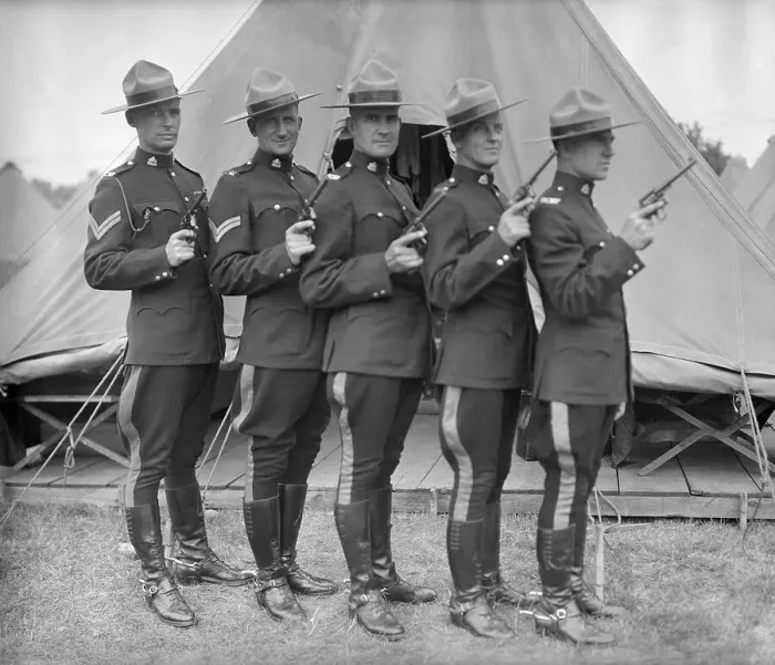 Framed Print : Canadian Mounted Police Holding Guns Framed Print : Canadian Mounted Police Holding Guns