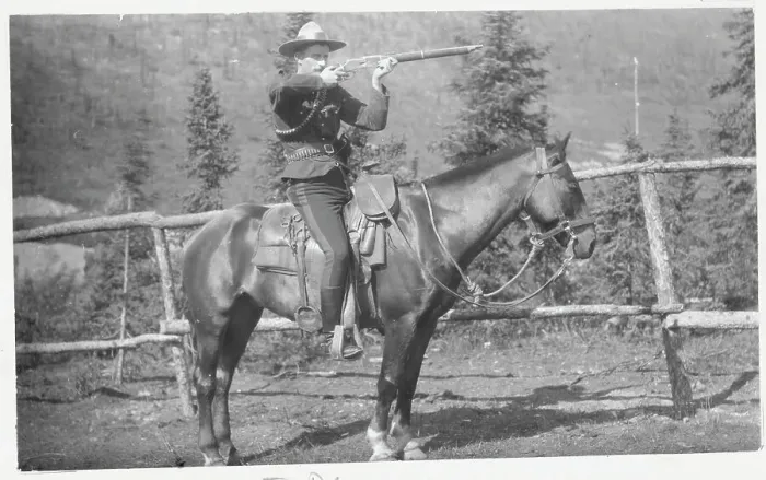 Framed Print : Canadian Mounted Policeman Aiming His Rifle Framed Print : Canadian Mounted Policeman Aiming His Rifle