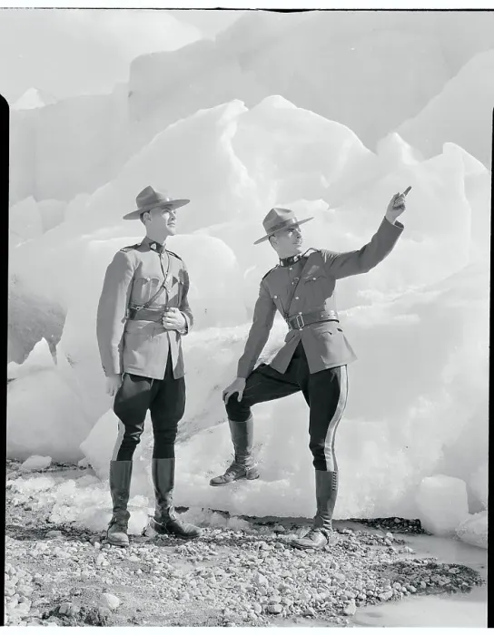 Framed Print : Canadian Mounties Conversing near Glacial Formations Framed Print : Canadian Mounties Conversing near Glacial Formations