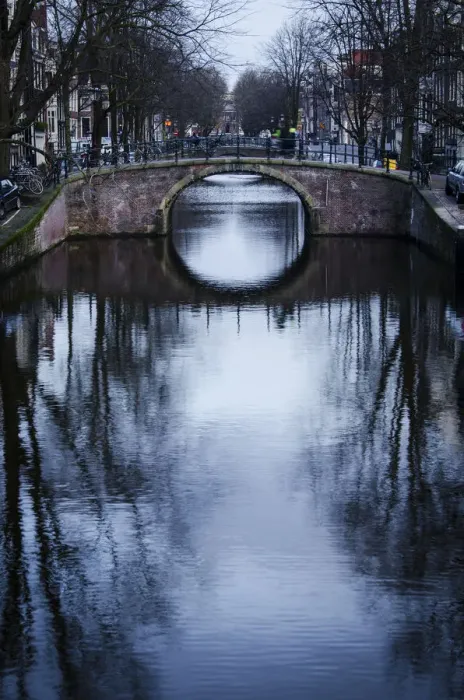 Framed Print : A Canal Bridge in the Capital City of Amsterdam, Netherlands Framed Print : A Canal Bridge in the Capital City of Amsterdam, Netherlands