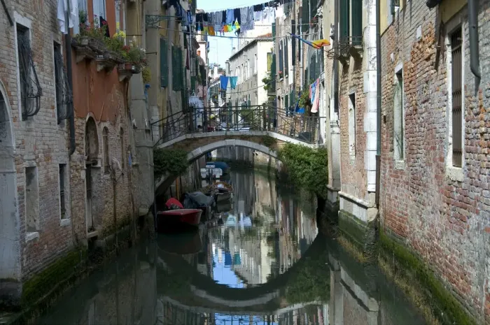 Framed Print : Canal and clothings Venice Italy Framed Print : Canal and clothings Venice Italy