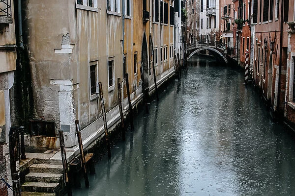 Canal in Venice under the rain