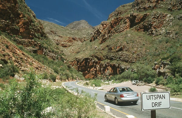 canyon, car, cliff, color image, day, extreme terrain, horizontal, journey, landscape
