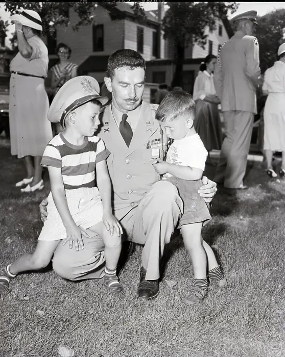 Framed Print : Captain Showing Children His Medal