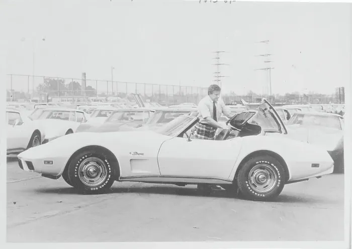 Framed Print : Car Dealer Examining His Own Recent Purchase Framed Print : Car Dealer Examining His Own Recent Purchase
