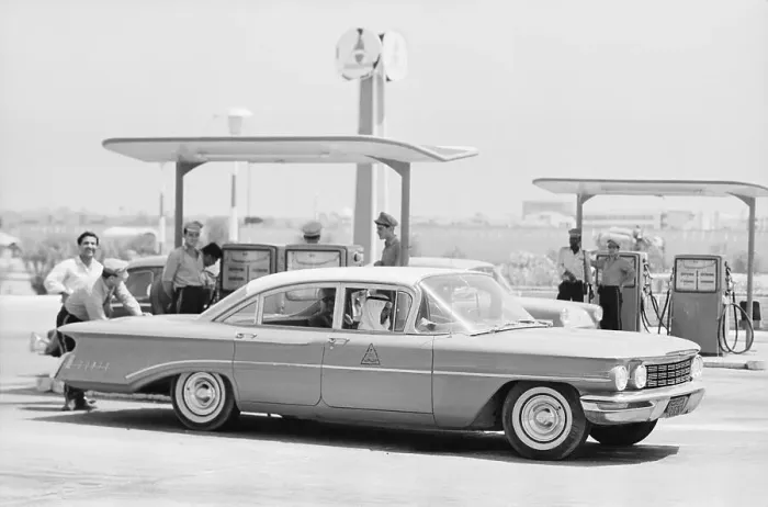 Framed Print : Car Filling Up at Gas Station Framed Print : Car Filling Up at Gas Station
