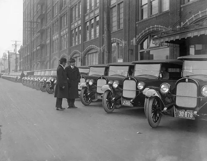 Framed Print : Car Makers Inspecting Their Product Framed Print : Car Makers Inspecting Their Product