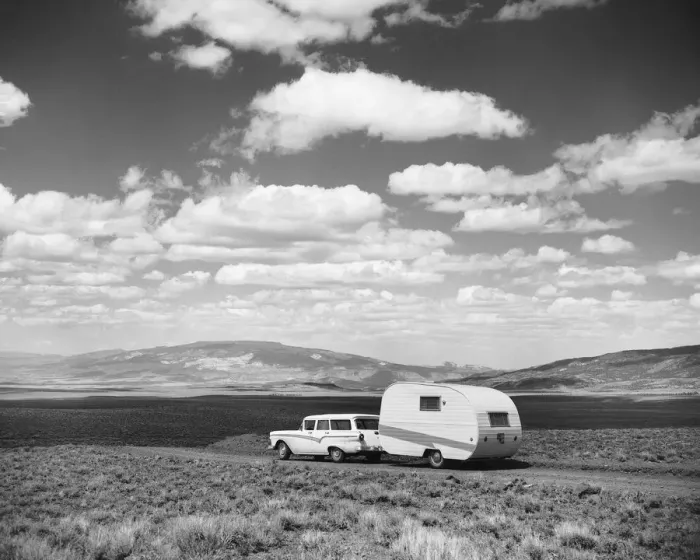 Framed Print : Car pulling trailer on road Framed Print : Car pulling trailer on road