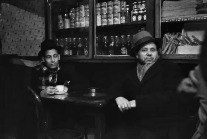 Framed Print : Cardiff. Two men sit at a table in a combined cafe and shop in Cardiff, 1939 Framed Print : Cardiff. Two men sit at a table in a combined cafe and shop in Cardiff, 1939