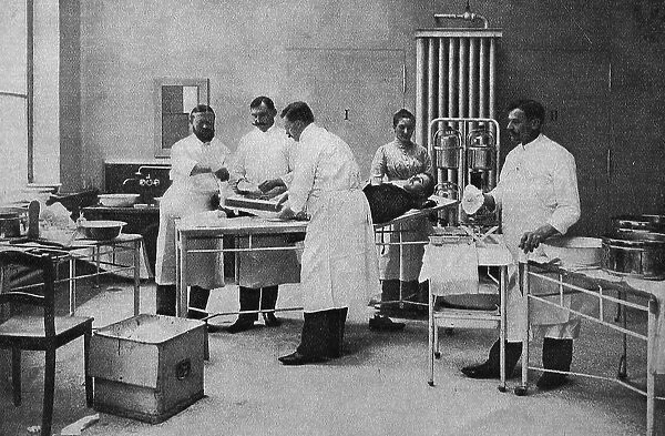 Caring for a casualty at a main ambulance station in Berlin, Germany, 1895, Historic, digital reproduction of an original 19th-century document
