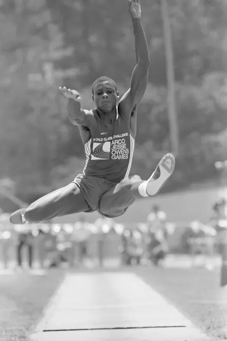 Framed Print : Carl Lewis Doing Long Jump Framed Print : Carl Lewis Doing Long Jump