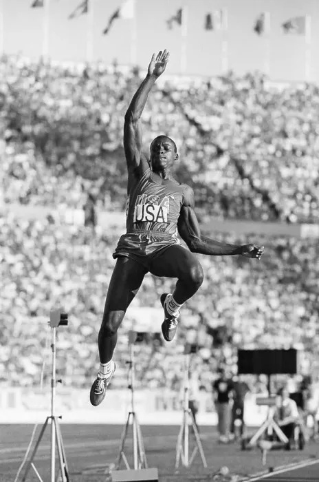 Framed Print : Carl Lewis In Mid-Air Doing Long Jump Framed Print : Carl Lewis In Mid-Air Doing Long Jump