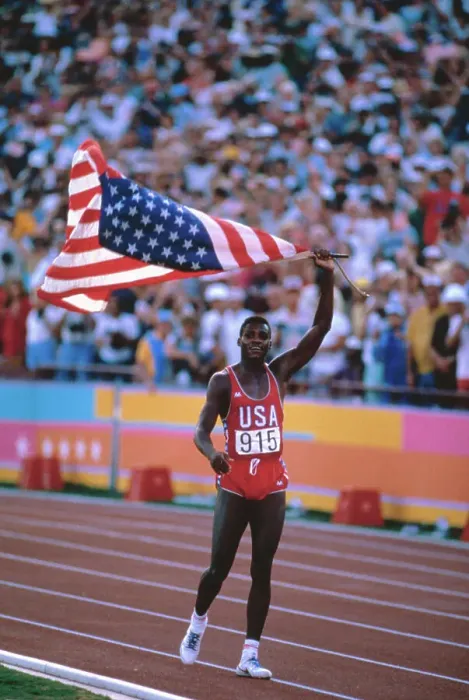 Framed Print : Carl Lewis Running with American Flag Framed Print : Carl Lewis Running with American Flag