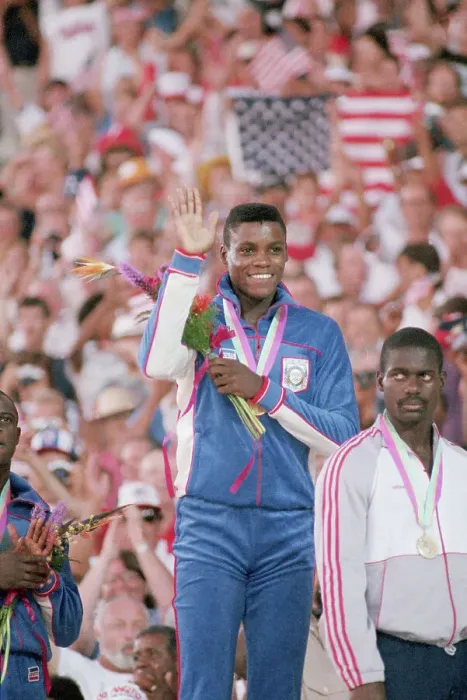 Framed Print : Carl Lewis Waving From Gold Medal Podium Framed Print : Carl Lewis Waving From Gold Medal Podium