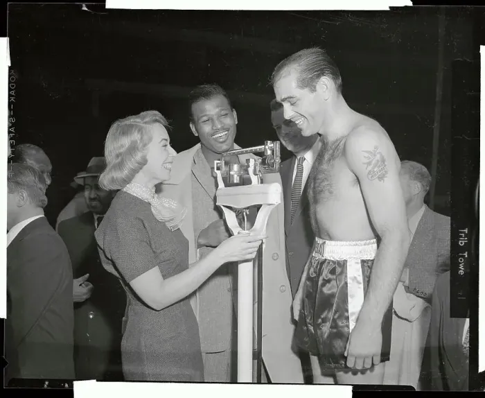 Framed Print : Carl Olson Being Weighed by Joyce Brothers Framed Print : Carl Olson Being Weighed by Joyce Brothers