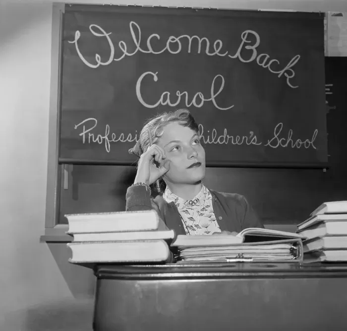 Framed Print : Carol Heiss Sitting at Desk With Books Framed Print : Carol Heiss Sitting at Desk With Books