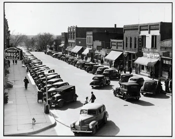 Framed Print : Cars Parked on Town Street Framed Print : Cars Parked on Town Street