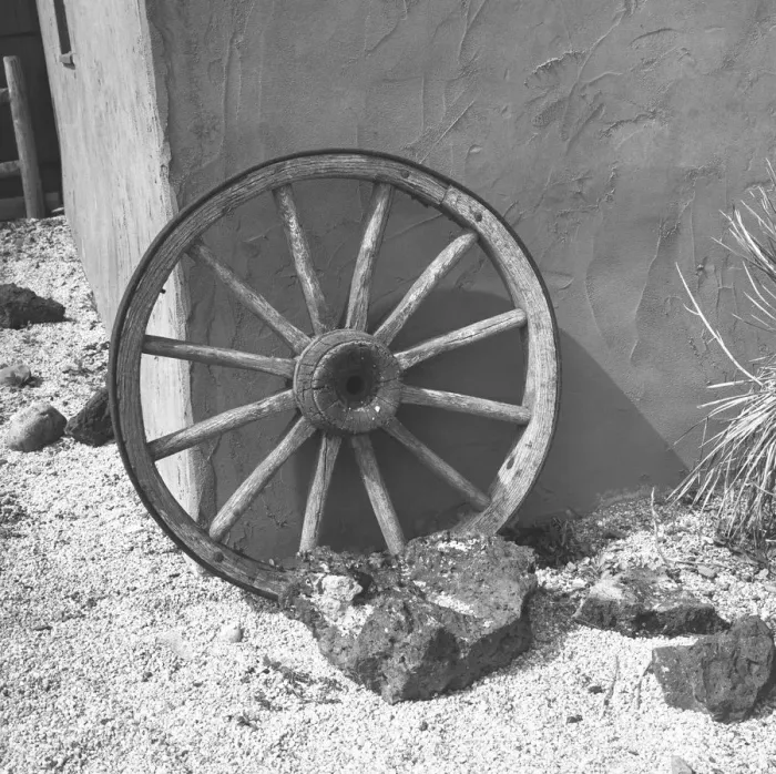 Framed Print : Cartwheel leaning by wall, (B&W) Framed Print : Cartwheel leaning by wall, (B&W)