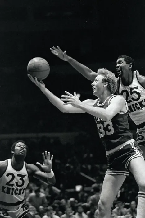 Framed Print : Bill Cartwright Reaching Past Larry Bird for Basketball