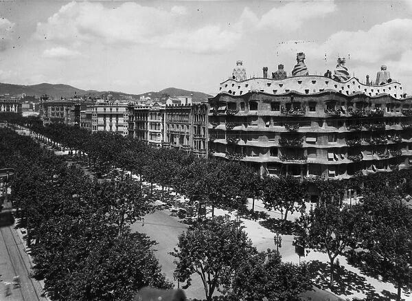 Casa Mila. circa 1920: The tree lined Paseo de Gracia in Barcelona