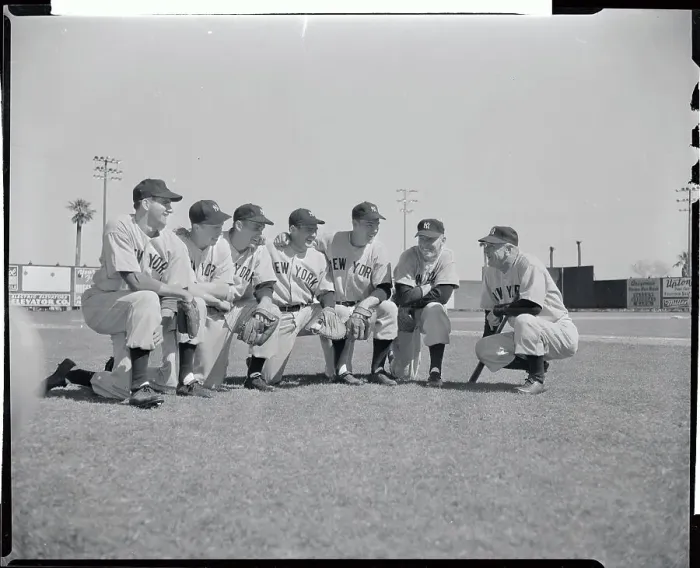 Framed Print : Casey Stengel Bending to Talk to Players Crouched on Field Framed Print : Casey Stengel Bending to Talk to Players Crouched on Field