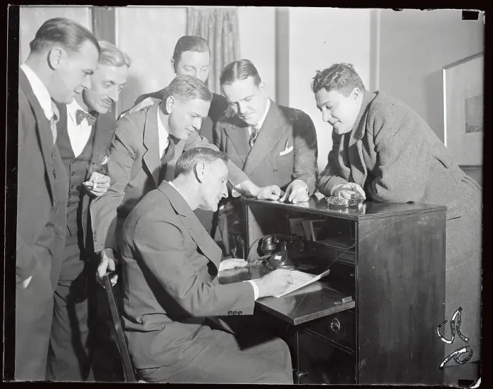 Framed Print : Casey Stengel Sitting at Desk and Surrounded by Friends Framed Print : Casey Stengel Sitting at Desk and Surrounded by Friends